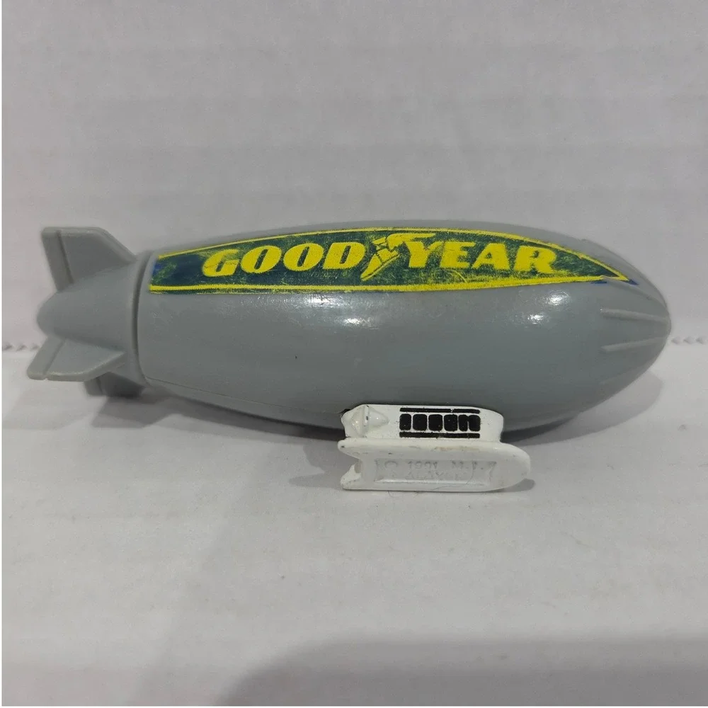 Vintage 1991 Hot Wheels Goodyear Blimp Gray Die-Cast Toy Changeable Graphics